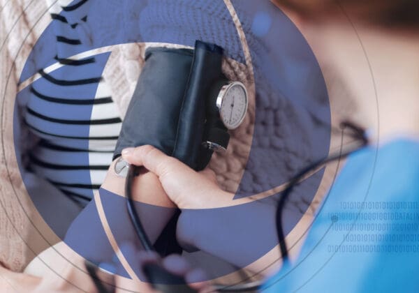 Nurse taking a patient's blood pressure